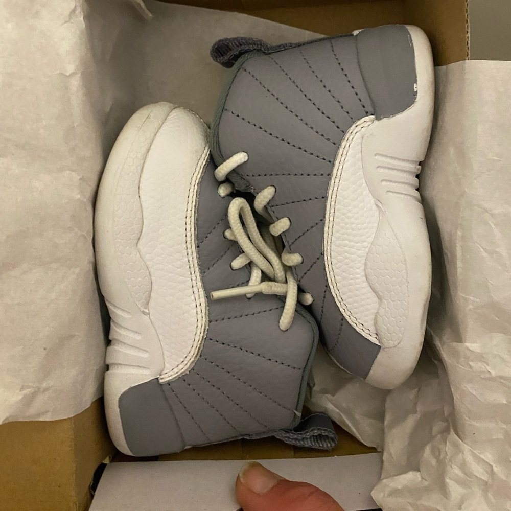 Jordan’s 12Retro (TD) 5c gray and white